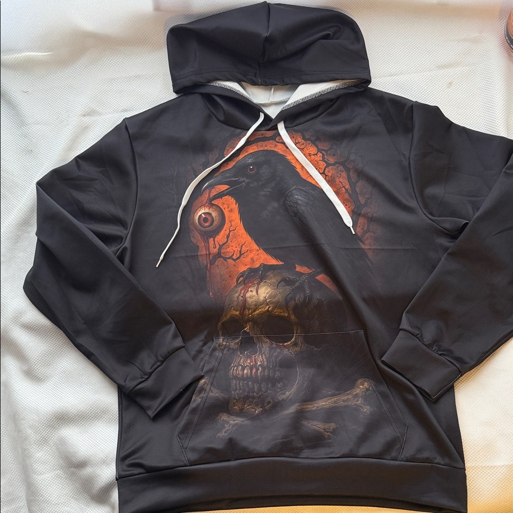 Black Graphic Hoodie with Raven and Skull Design